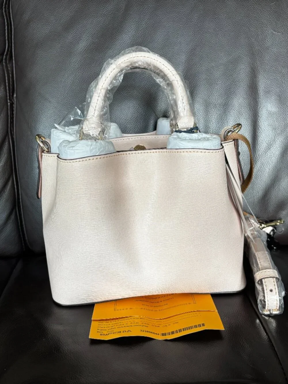 NWT Dooney and Bourke Mini Barlow in Blush, incl strap, registration, dust bag